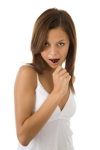 Young pretty girl with cherry on the white — Stock Photo, Image