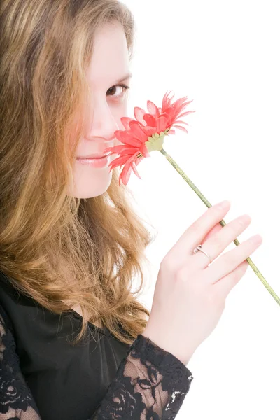 Portret van mooi meisje met bloem — Stockfoto