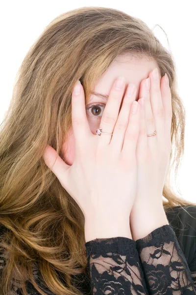 Cheerful girl closing her face — Stock Photo, Image