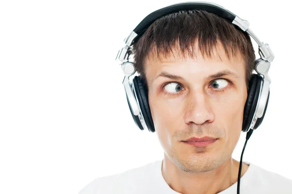 Funny picture of man with headphones on white — Stock Photo, Image
