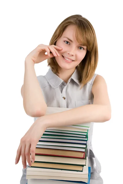 Young girl with books. Isolated on white background — Stock Photo, Image