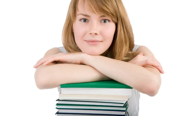 Giovane ragazza con dei libri. Isolato su sfondo bianco — Foto Stock