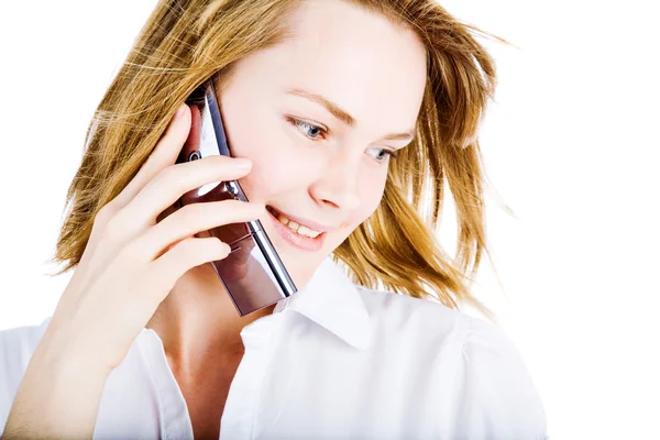 白い背景の上の携帯電話で美しい少女 ロイヤリティフリーのストック画像