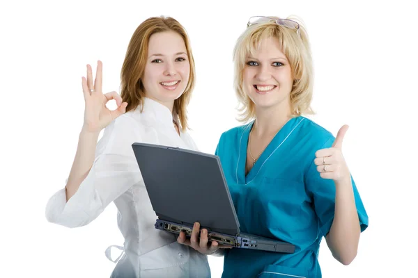 stock image A beautiful young female doctors, carrying medical files.