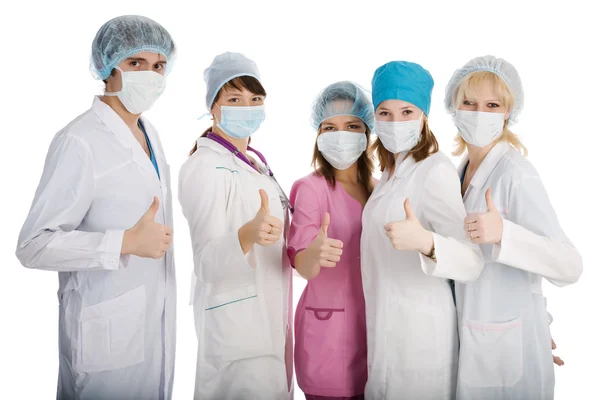 Grupa młodych lekarzy na białym tle — Zdjęcie stockowe