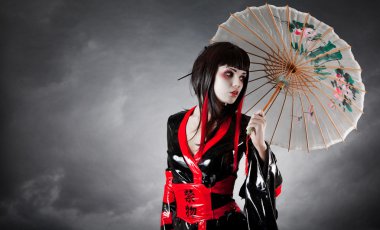 Modern style geisha in fetish kimono clipart