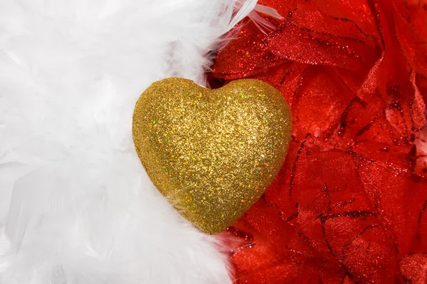 Heart over white and red feathers background — Stock Photo, Image