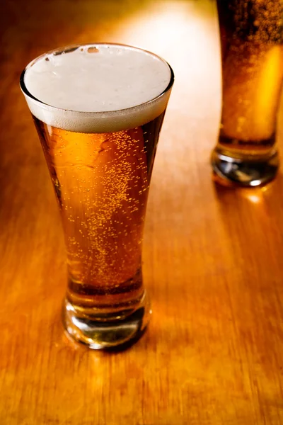 Two beer glasses, selective focus — Stock Photo, Image
