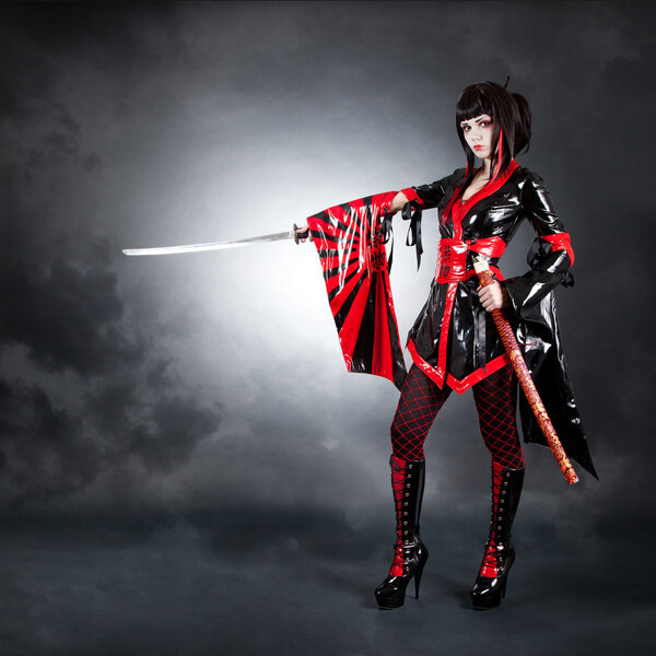 Full length shot of warrior girl wearing fetish kimono and high heeled boots