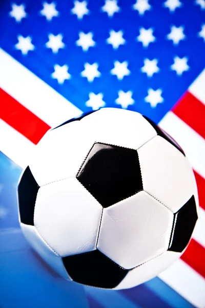 Amerykańska piłka nożna i flaga — Zdjęcie stockowe