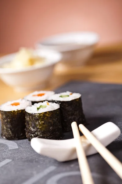 Sushi on the plate with chopstick — Stock Photo, Image