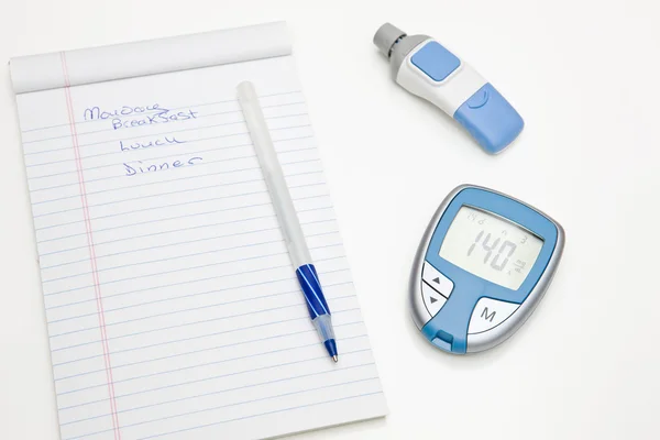Cukrzycowej dziennik, Glukometr i lancet — Zdjęcie stockowe