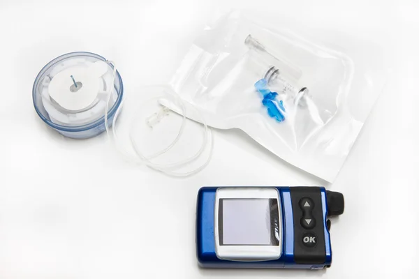 Инсулин, насос, инфузионный набор и резервуар Стоковое Фото