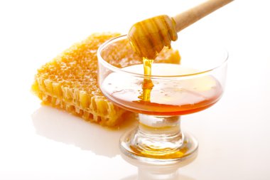 Spoon and honey comb clipart