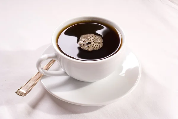 Drip coffee with bubbles — Stock Photo, Image