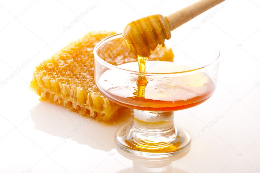 Spoon and honey comb