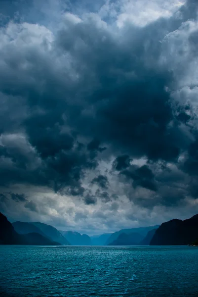 Fjord met donkere wolken — Stockfoto