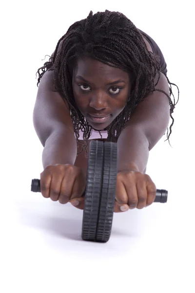 Mujer africana haciendo ejercicio — Foto de Stock