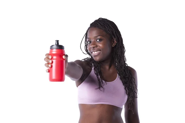 Γυναίκα αθλητή που δείχνει το μπουκάλι νερό — Φωτογραφία Αρχείου