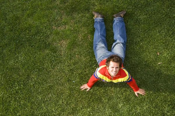 Exercising on the grass — Stock Photo, Image