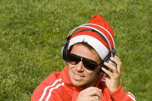 Santa houdt van muziek — Stockfoto