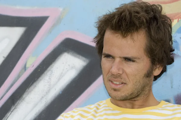 stock image Men next to a graffiti wall