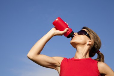 Woman drinking water clipart