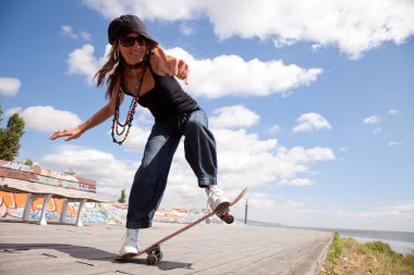 Cool skateboard woman clipart