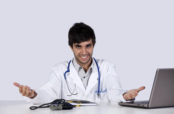 Frendly young doctor at his office — Stock Photo, Image