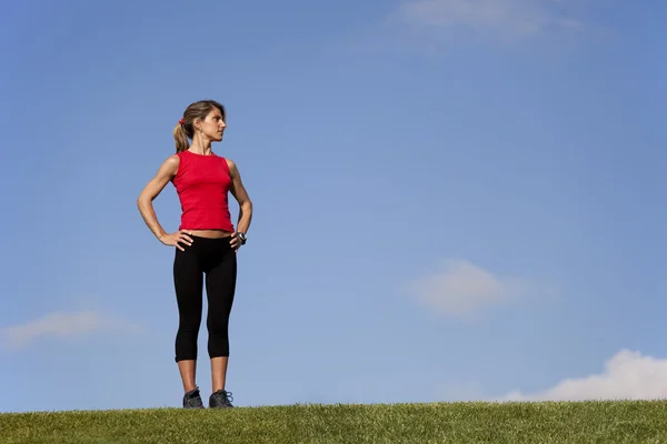 Sport woman at the field — Stock Photo, Image