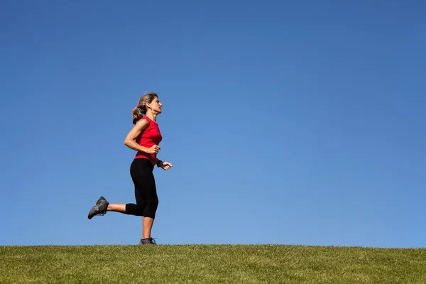 Mujer corriendo — Foto de Stock