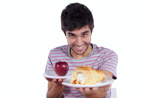 Young man food temptation Royalty Free Stock Images