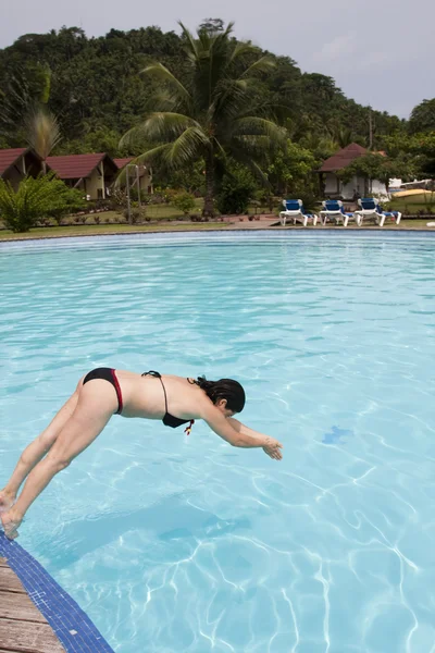 Jumping into the pool — Stock Photo, Image