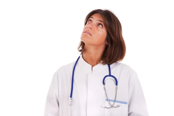 Kvinna läkare tittar upp — Stockfoto