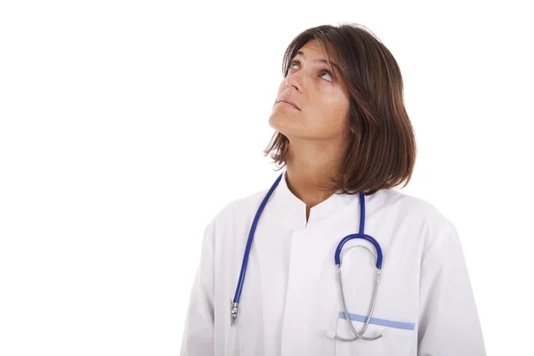 Woman doctor looking up — Stock Photo, Image