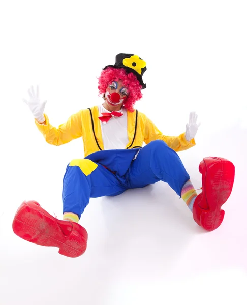 Funny clown on the floor — Stock Photo, Image