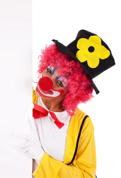 Funny clown holding a banner — Stock Photo, Image
