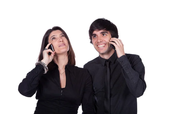 Uomini e donne che parlano al telefono — Foto Stock