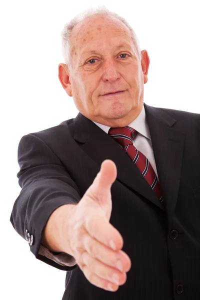 Handshake from a senior businessman — Stock Photo, Image
