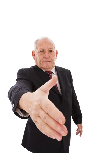 Handshake from a senior businessman — Stock Photo, Image