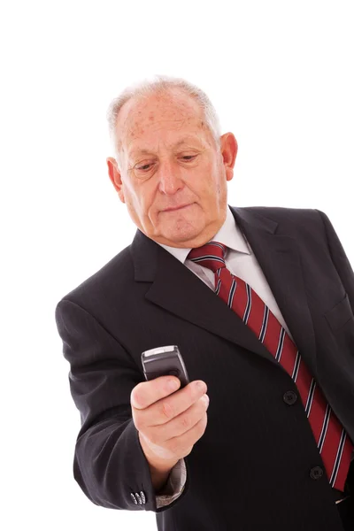 Senior schickt eine SMS — Stockfoto