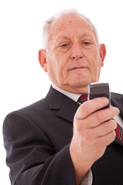 Senior sending a sms — Stock Photo, Image