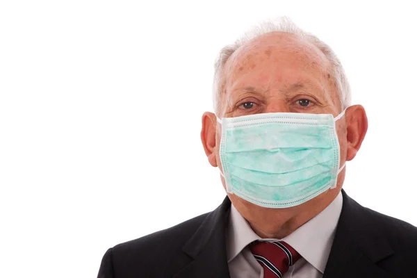 Older businessman with a mask — Stock Photo, Image