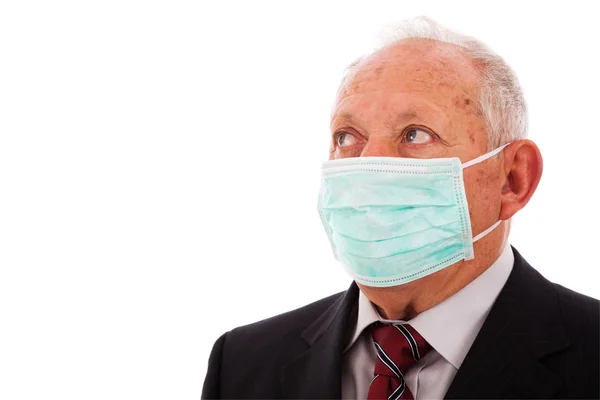 Older businessman with a mask — Stock Photo, Image