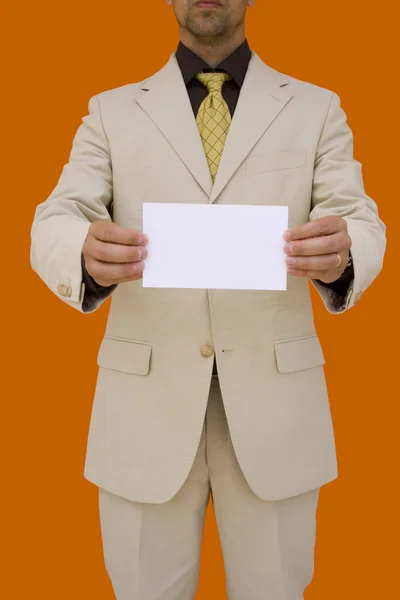 Uomo d'affari in possesso della sua carta — Foto Stock