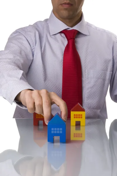 Businessman selling a house — Stock Photo, Image