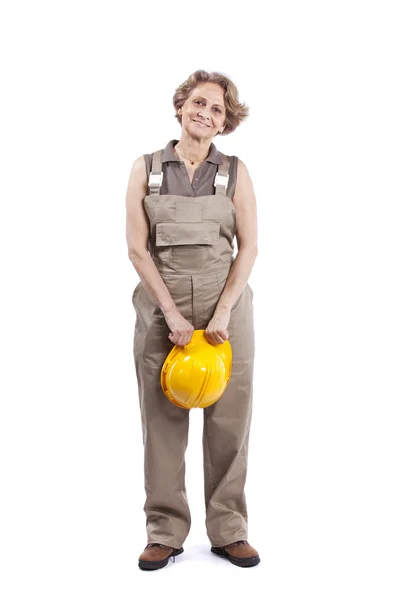 Senior woman with a safety hat — Stock Photo, Image