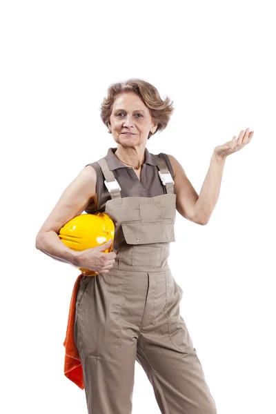 Senior woman with a safety hat — Stock Photo, Image