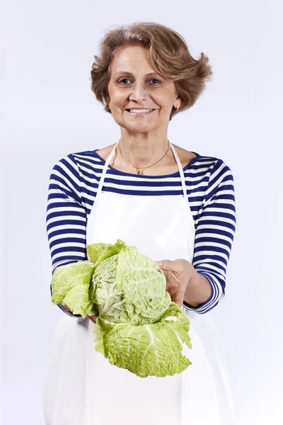 Senior woman with a sprout — Stock Photo, Image