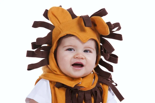 Baby mit Löwenmaske — Stockfoto
